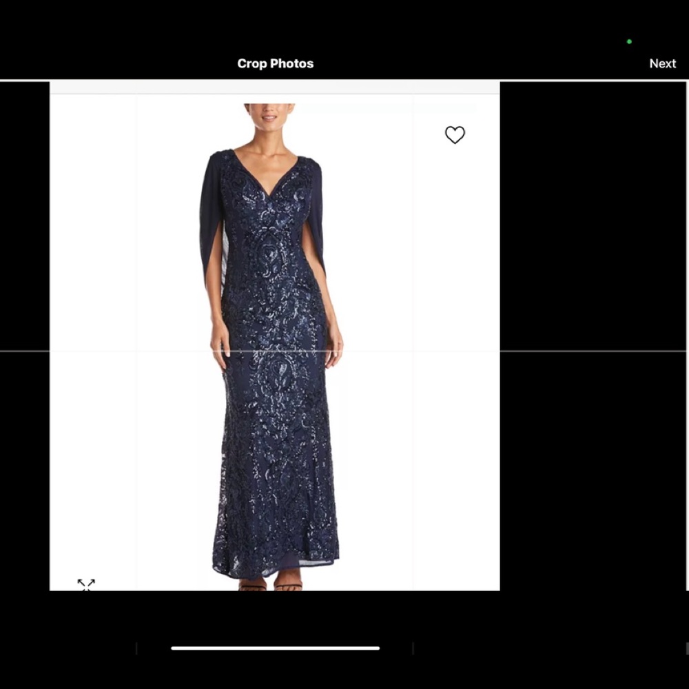 Stunning sequined floor length dress in navy blue.